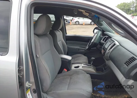 2014 Toyota Tacoma Base V6 z USA, uszkodzony, nr VIN 3TMLU4EN9EM156197